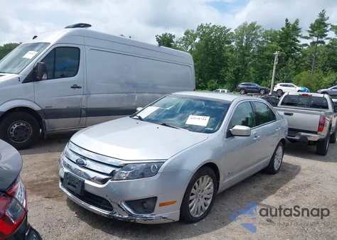 2012 Ford Fusion Hybrid z USA, uszkodzony, nr VIN 3FADP0L31CR202455